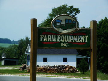 CJM FARM EQUIPMENT, INC. Logo