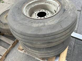 Titan 12.5L15 8 ply tire on white 6 bolt wheel