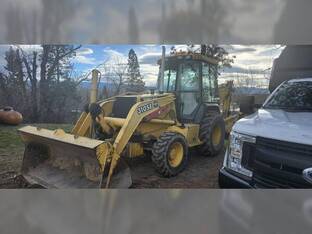 2000 John Deere 310SE