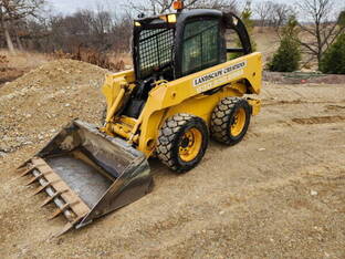 2003 John Deere 240-II